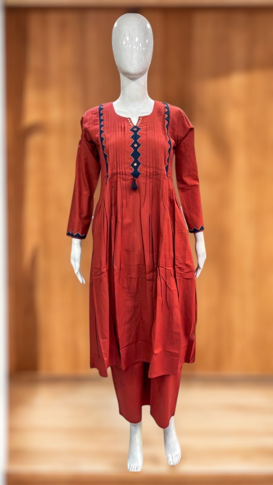 Orange cotton kurti with mirror and handwork, and bottom