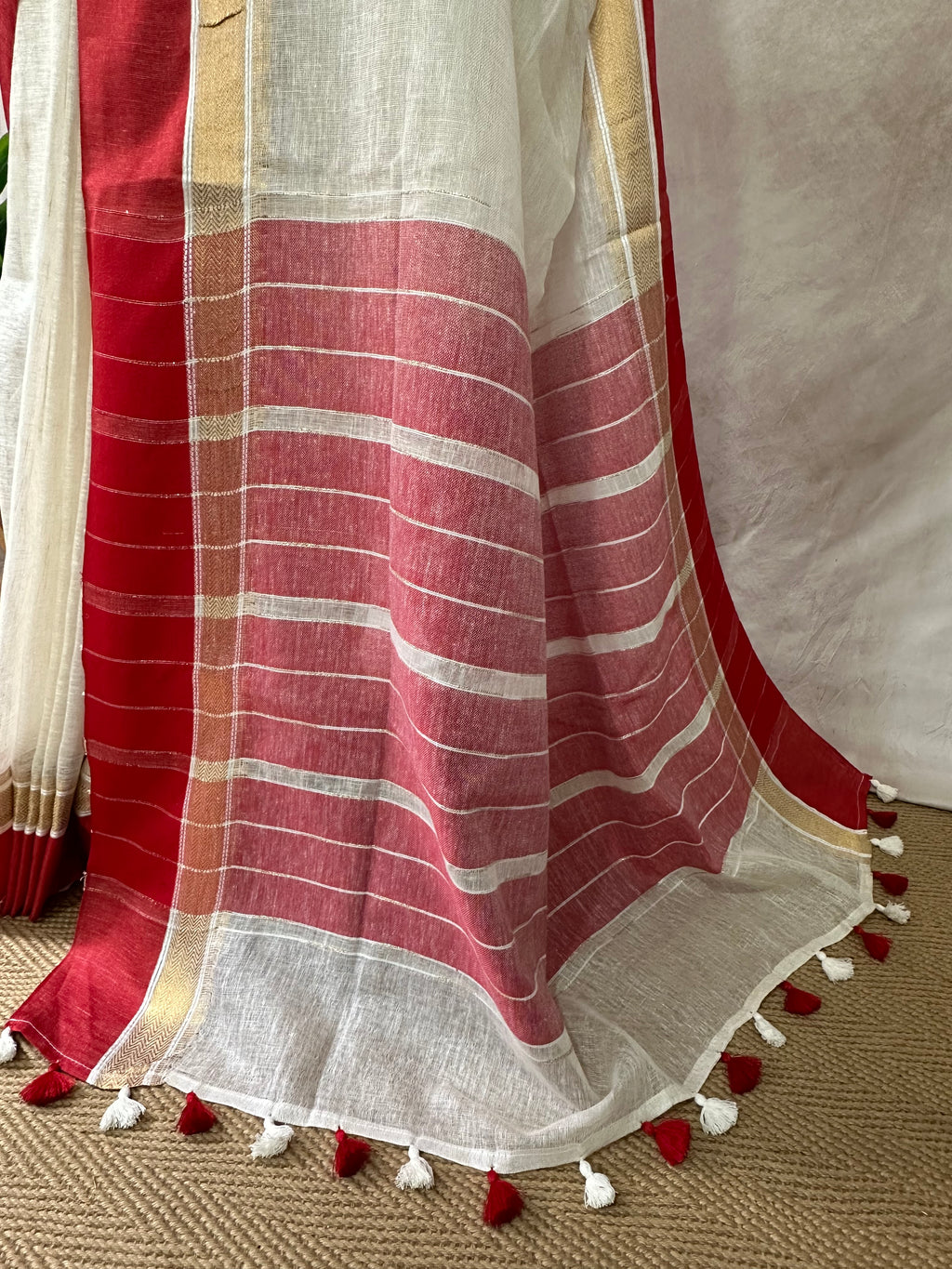 Red and gold border pure linen saree