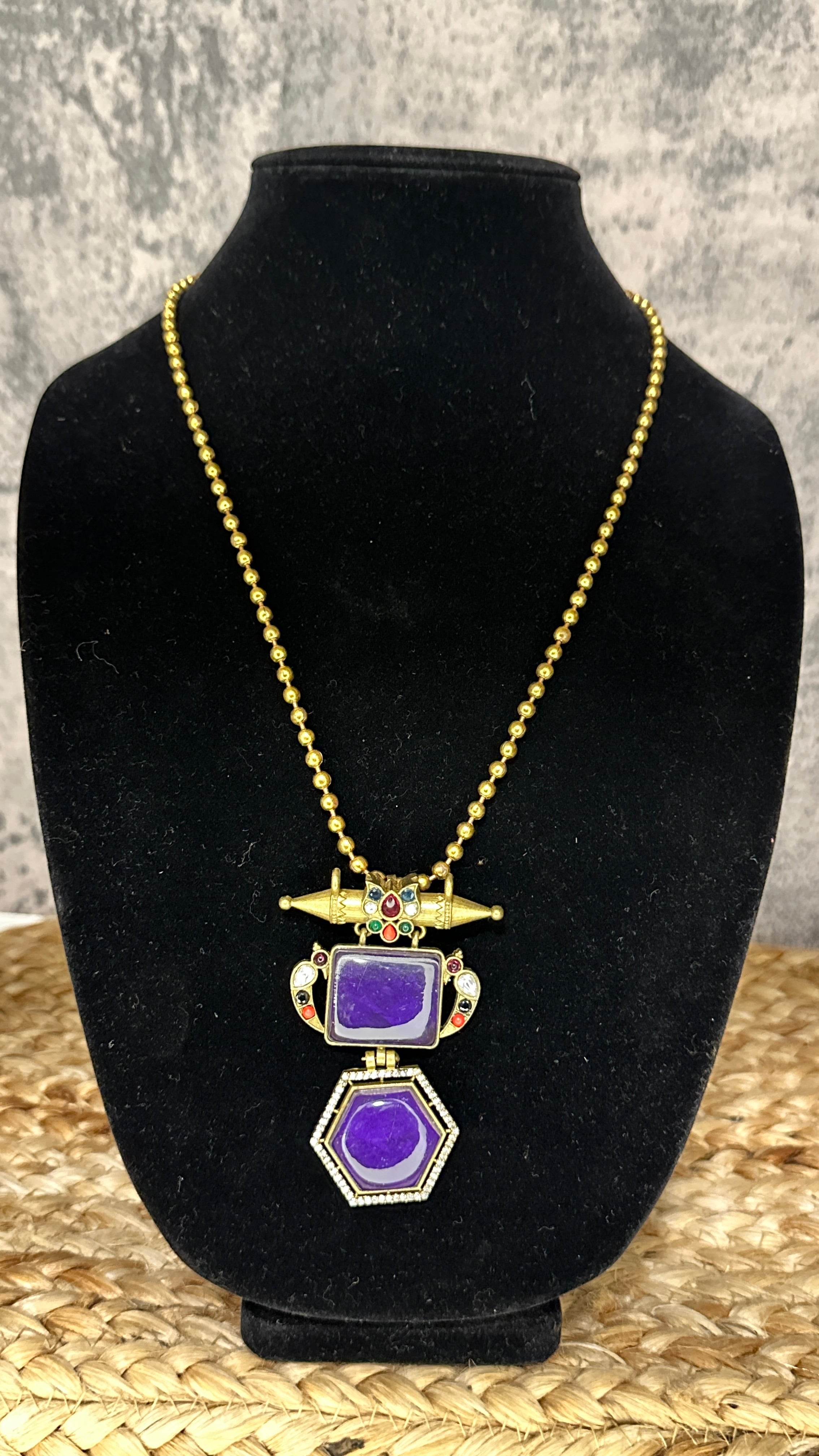 Dual tone neklace with purple stone