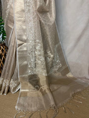 Beige Tissue Kotta silk saree with mirror and chikankari work, with stitched blouse