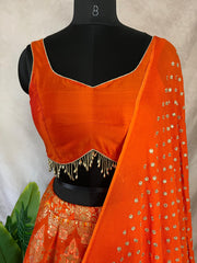 Orange Banarsi silk lehanga