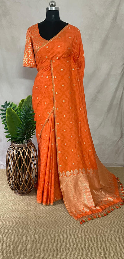 Orange pure munga silk saree with Tanchoi Weave , stitched blouse