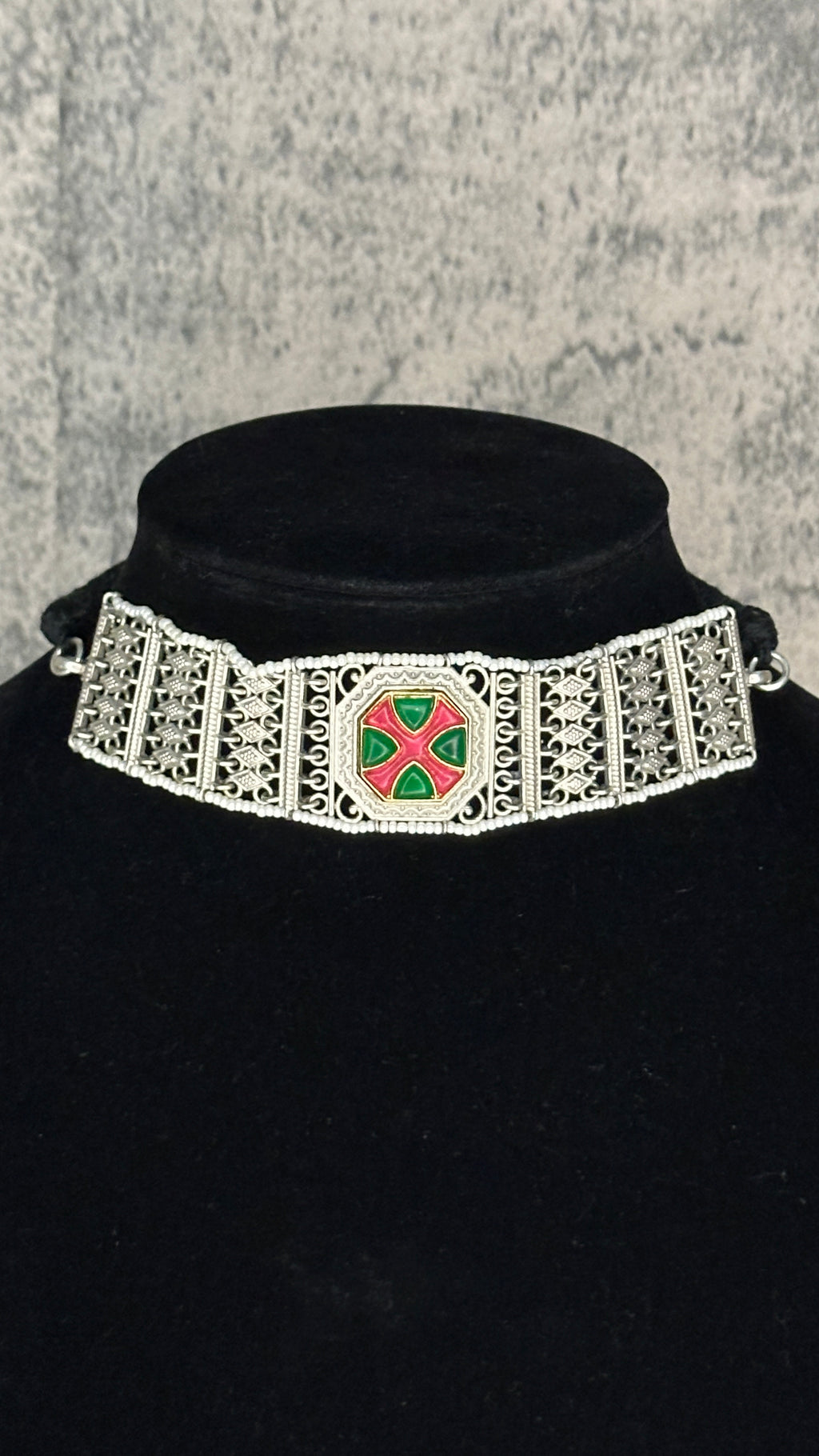 Choker with green and pink stones and studs