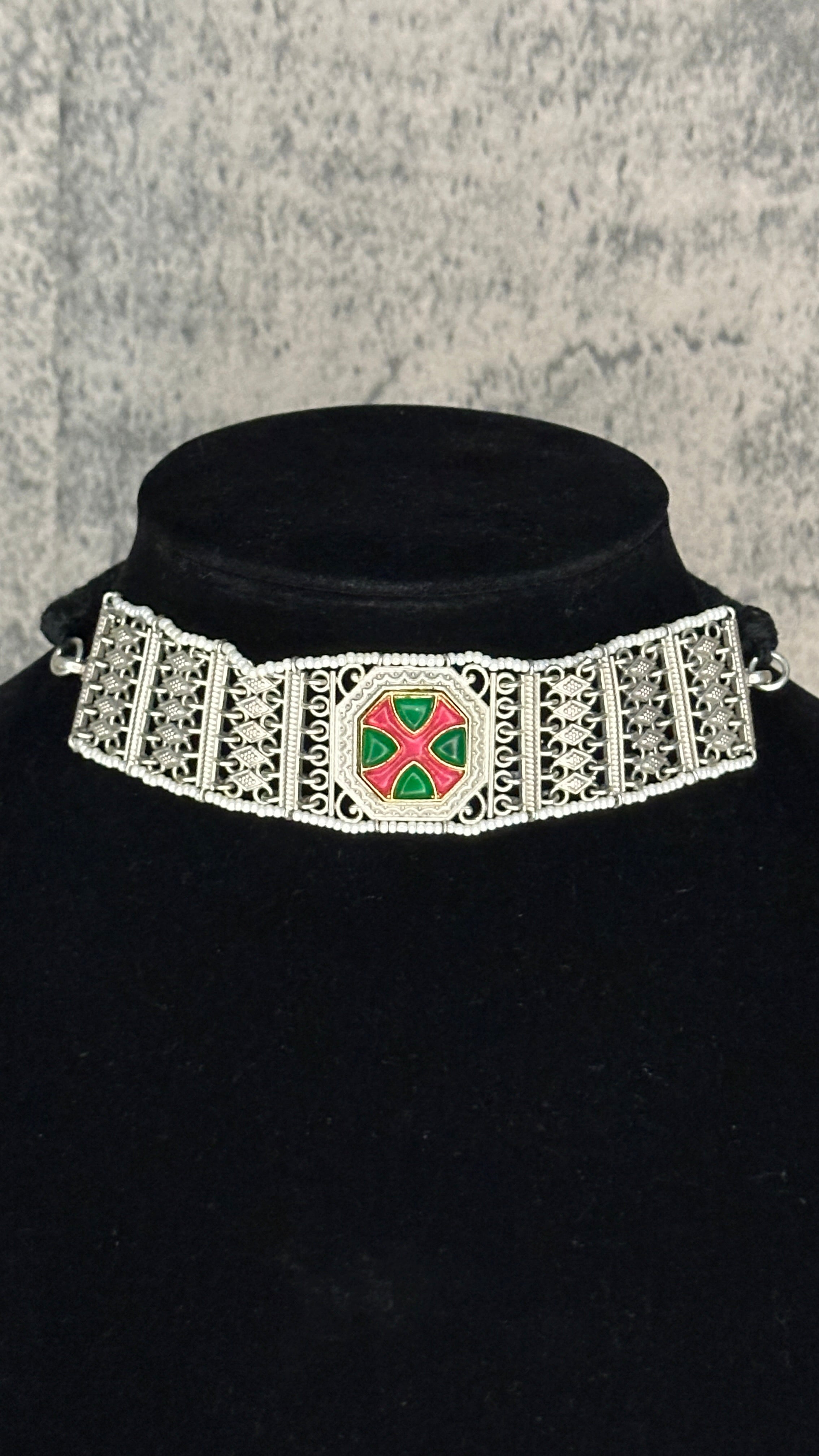 Choker with green and pink stones and studs