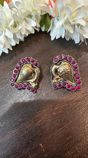 Dual tone studs with red stone