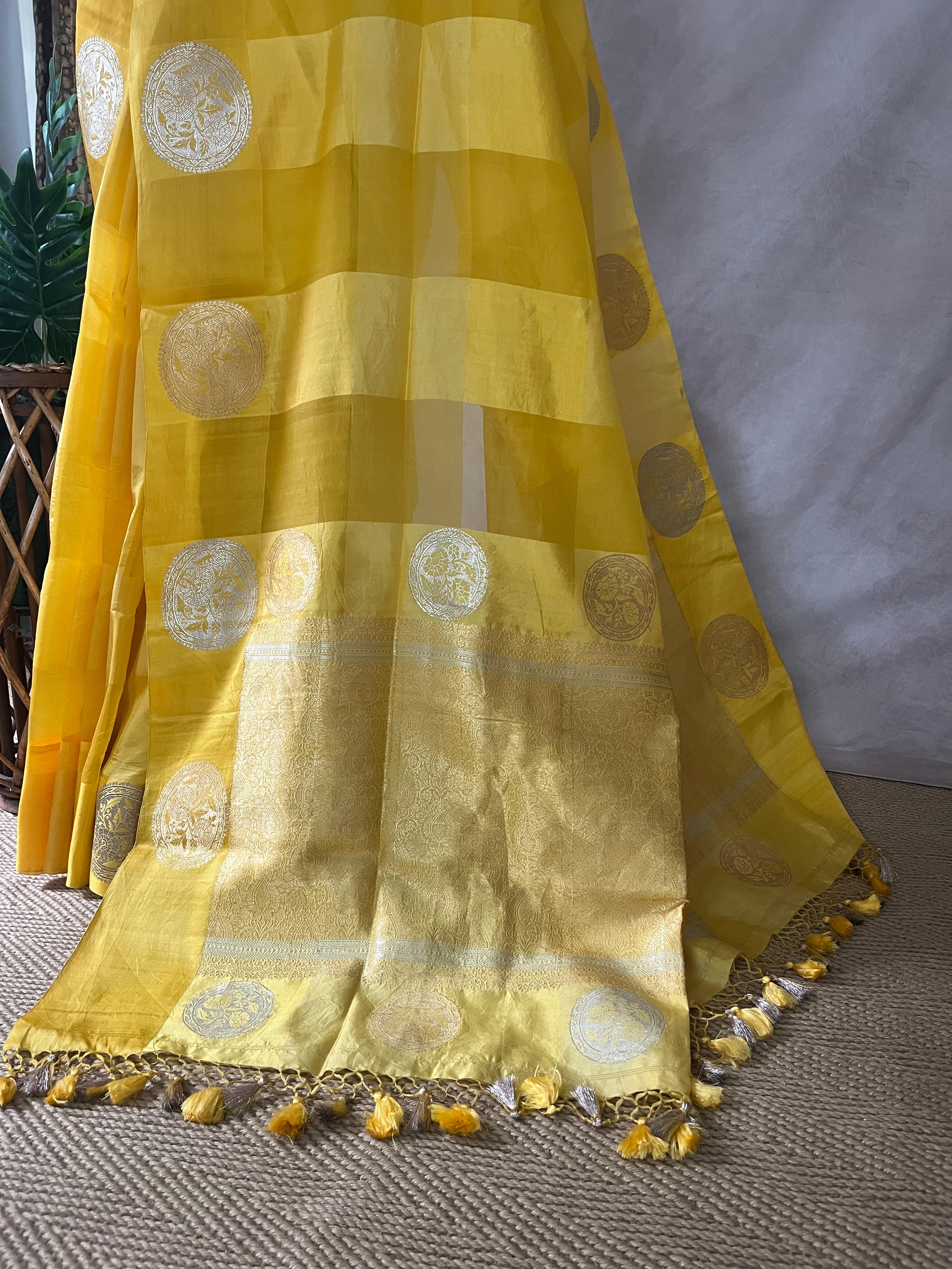 Yellow pure organza silk designer saree with stitched blouse
