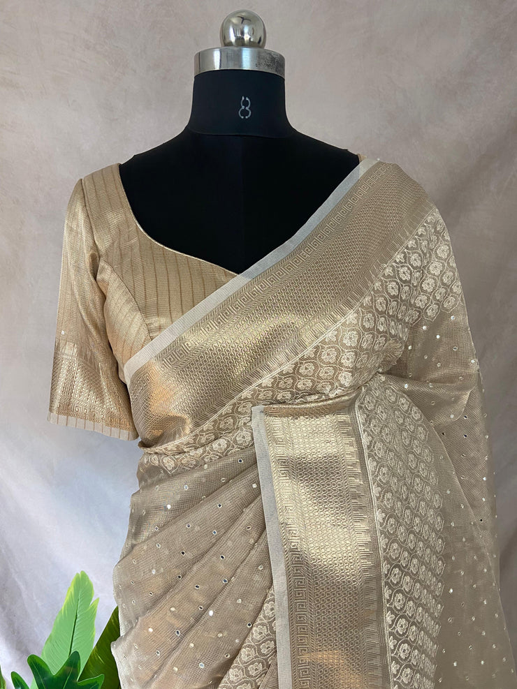 Beige Tissue Kotta silk saree with mirror and chikankari work, with stitched blouse