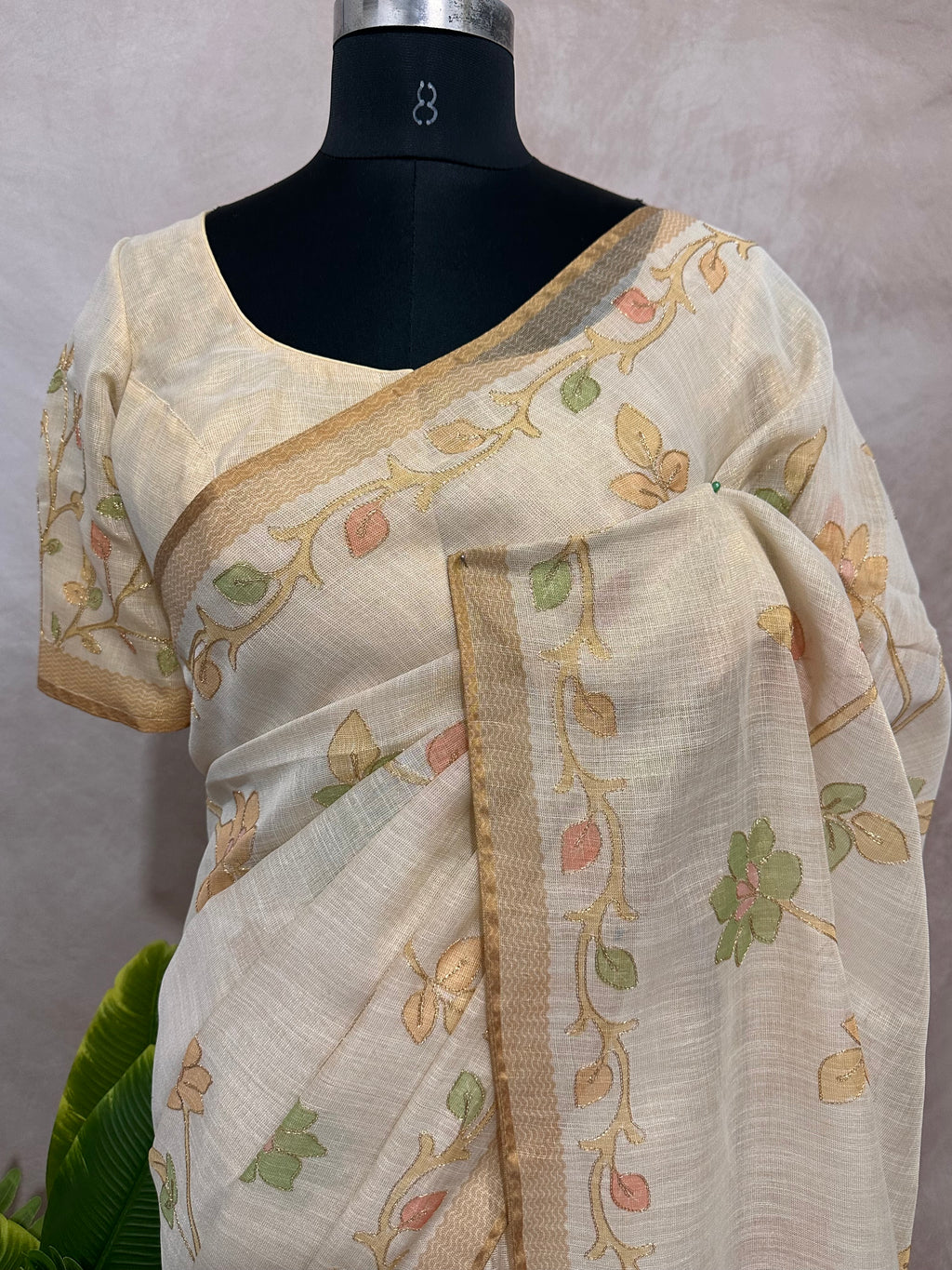 Printed Tissue linen saree with thread work, and stitched blouse