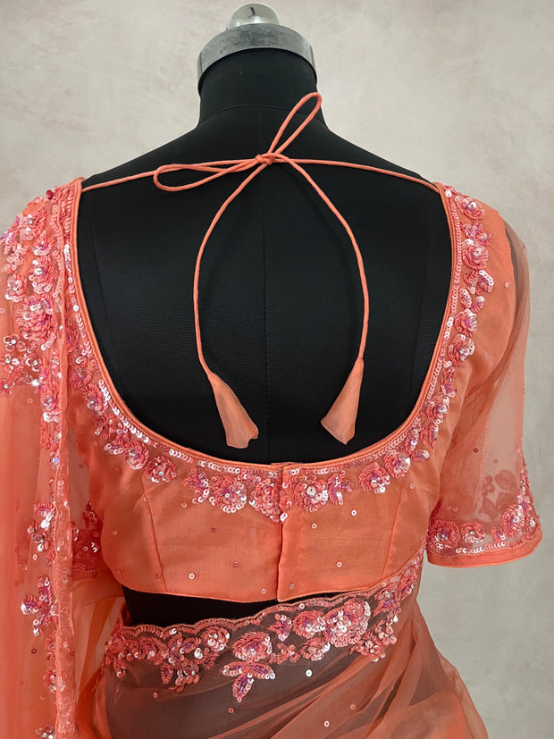 Soft Organza peach color saree with sequins work and stitched blouse