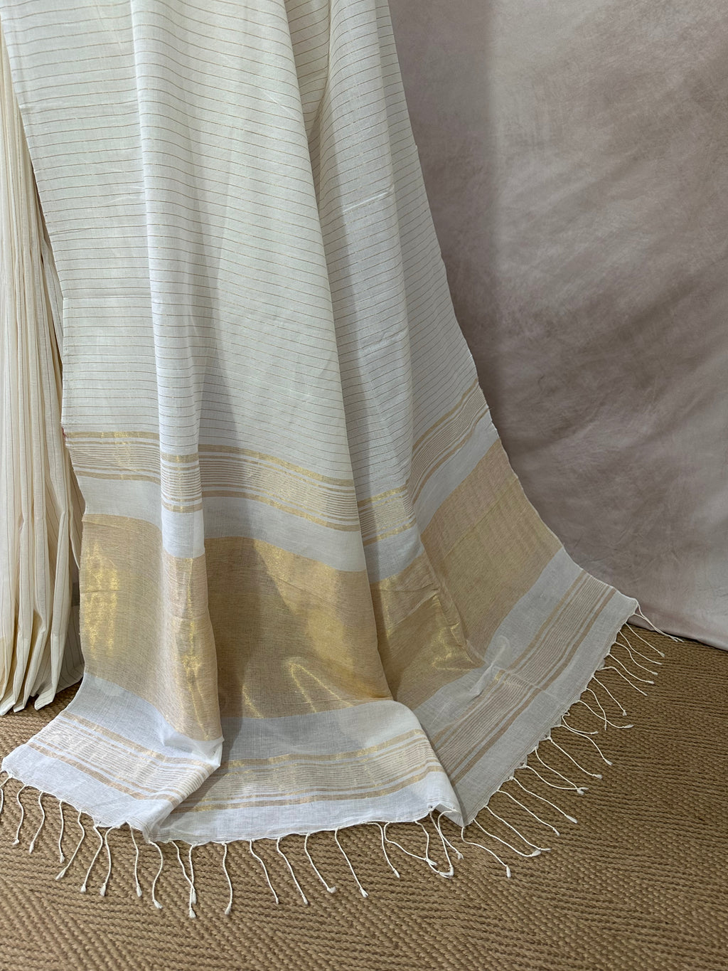 Off white pure cotton handloom saree with gold line