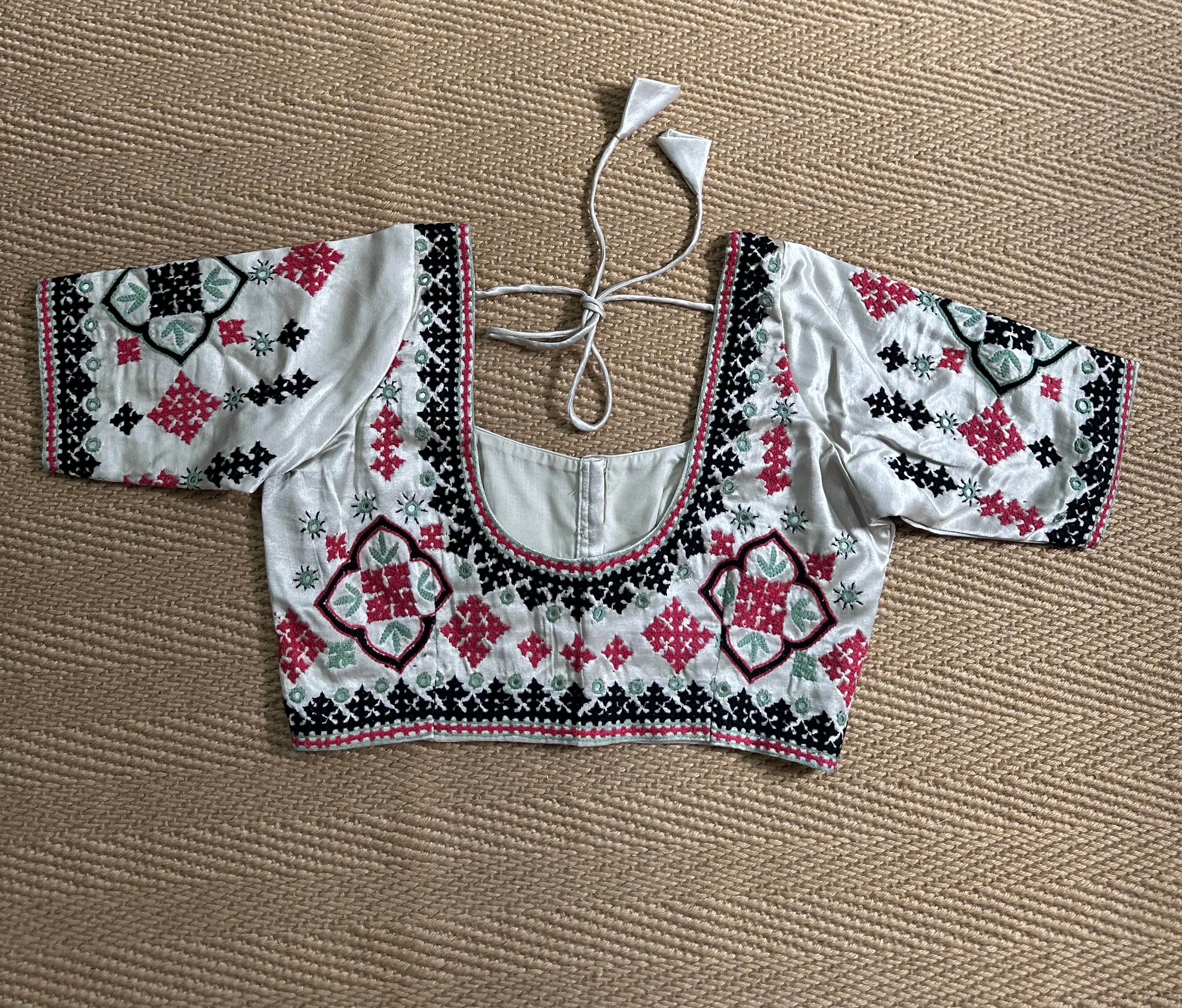 Light grey modal silk blouse with mirror work and hand Kutch Embroidery