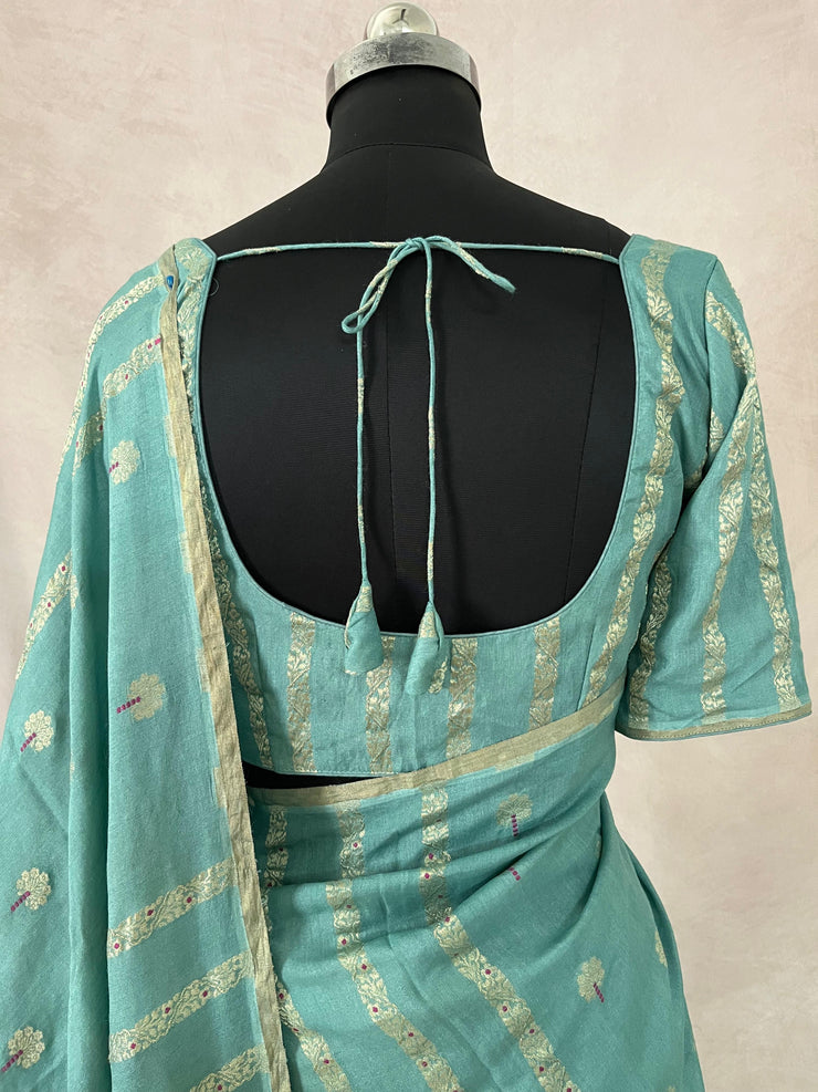 Pastel blue designer tussar georgette saree with meenakari weave , stitched blouse