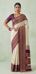 Asam silk saree with Purple broder and stitched blouse