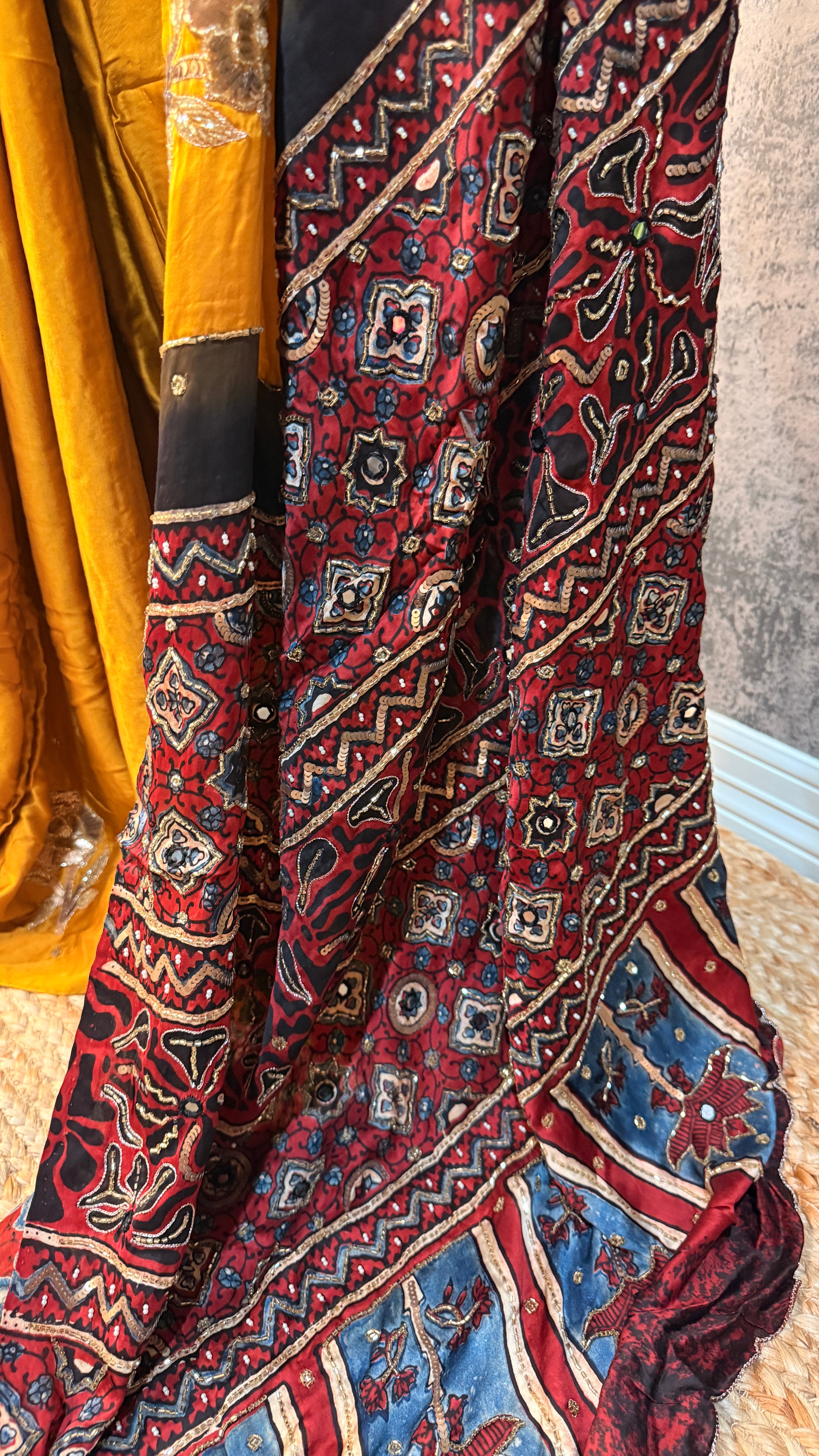 Modal silk saree with bead and mirror work , stitched blouse