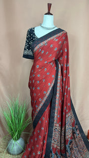 Red ajrakh hand blocked printed designer modal silk saree with stitched blouse