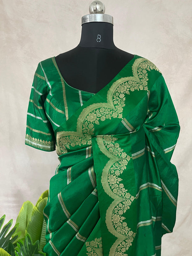 Green soft katan silk saree with silver border, with stitched blouse