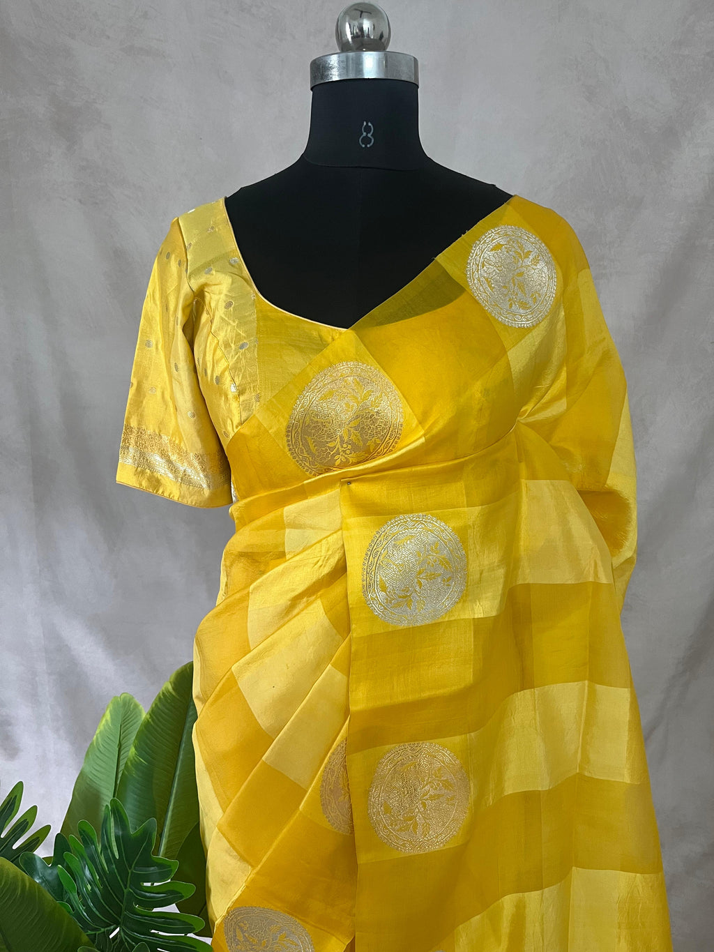 Yellow pure organza silk designer saree with stitched blouse