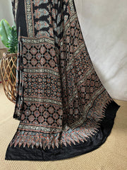 Black modal silk saree with hand work and stitched blouse