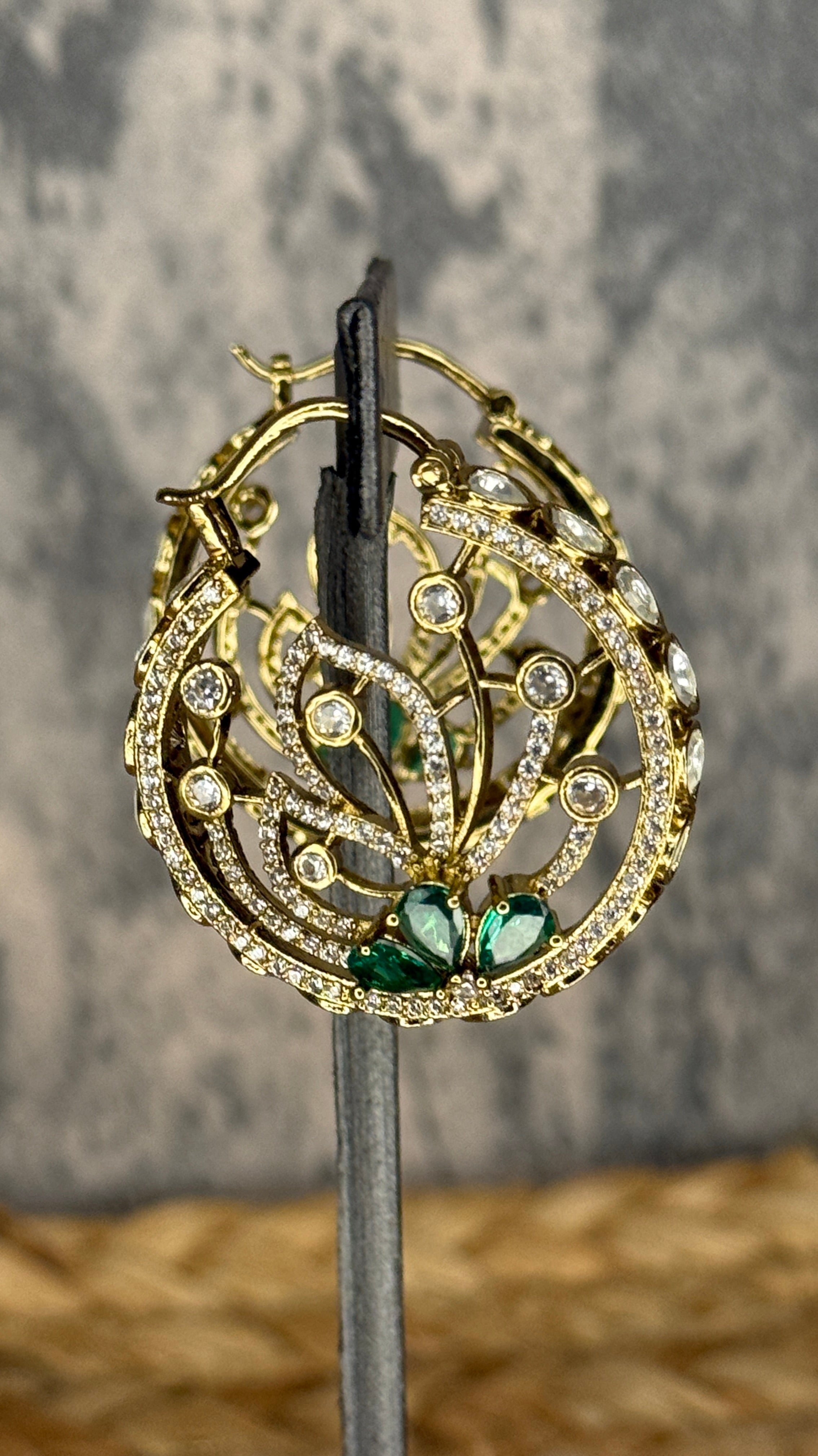 green and moissanite stone hoops