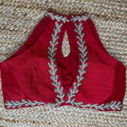 Red halter neck blouse with bead work