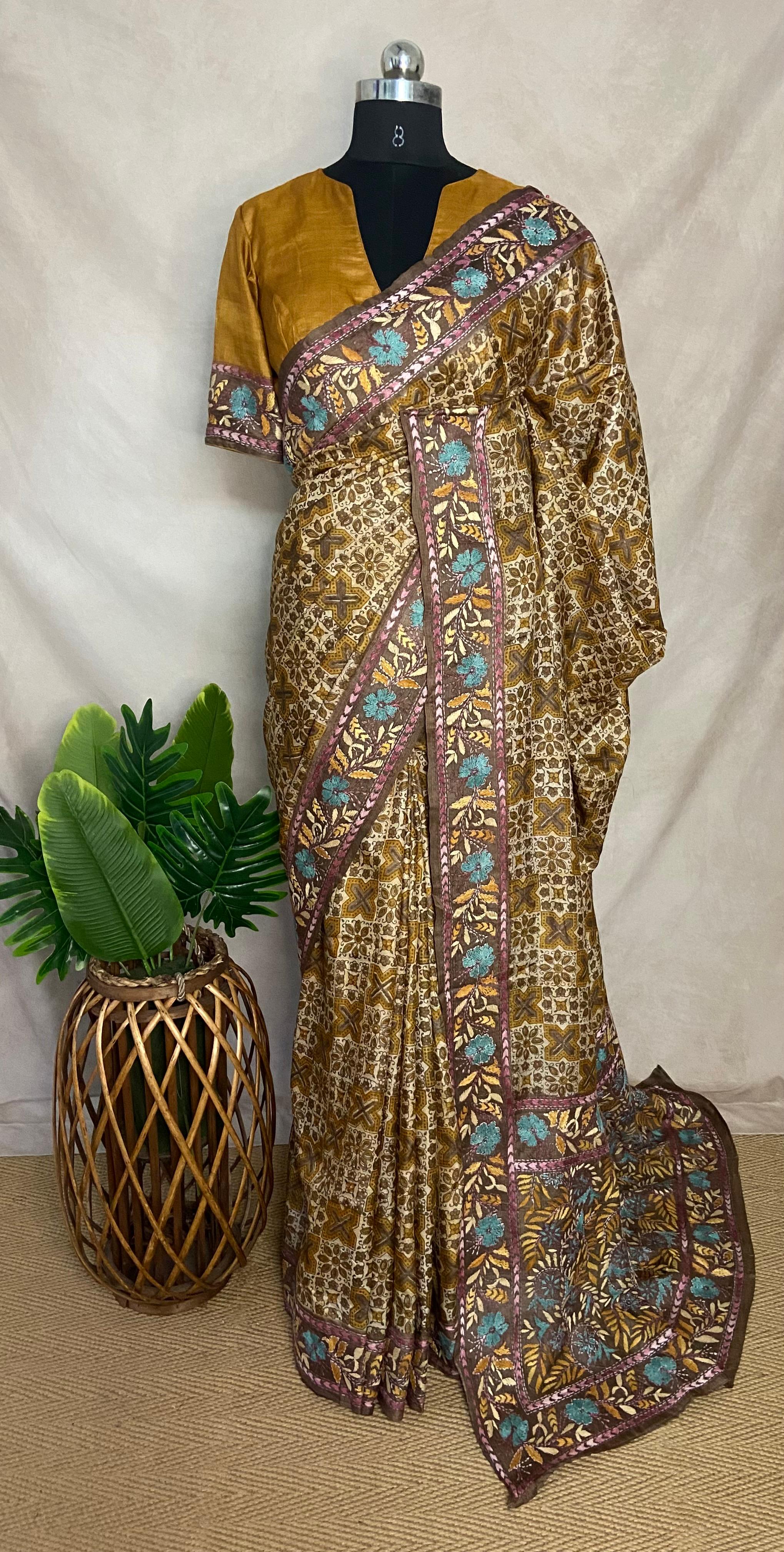 Pure tussar silk saree with Ajrakh hand block print and hand embroidery, stitched blouse