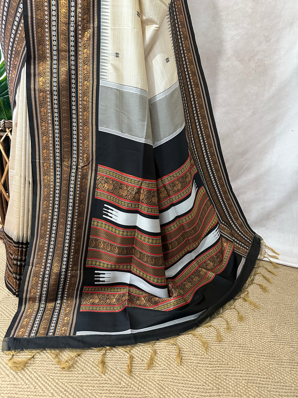 Asam silk saree with brown broder and stitched blouse