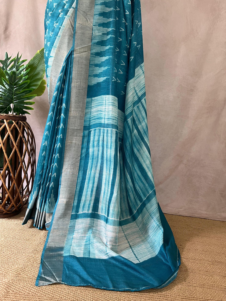 Light blue semi soft tussar silk saree with floral print, with stitched blouse