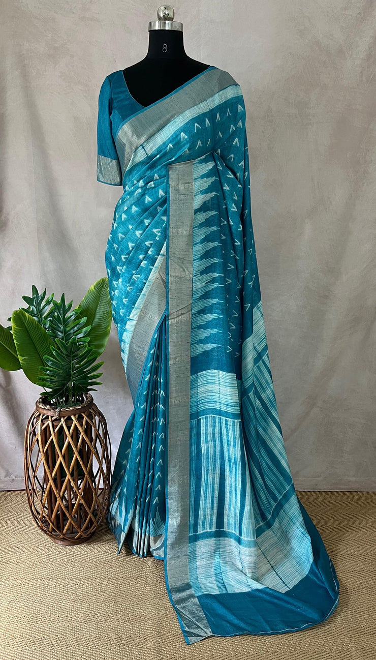 Light blue semi soft tussar silk saree with floral print, with stitched blouse