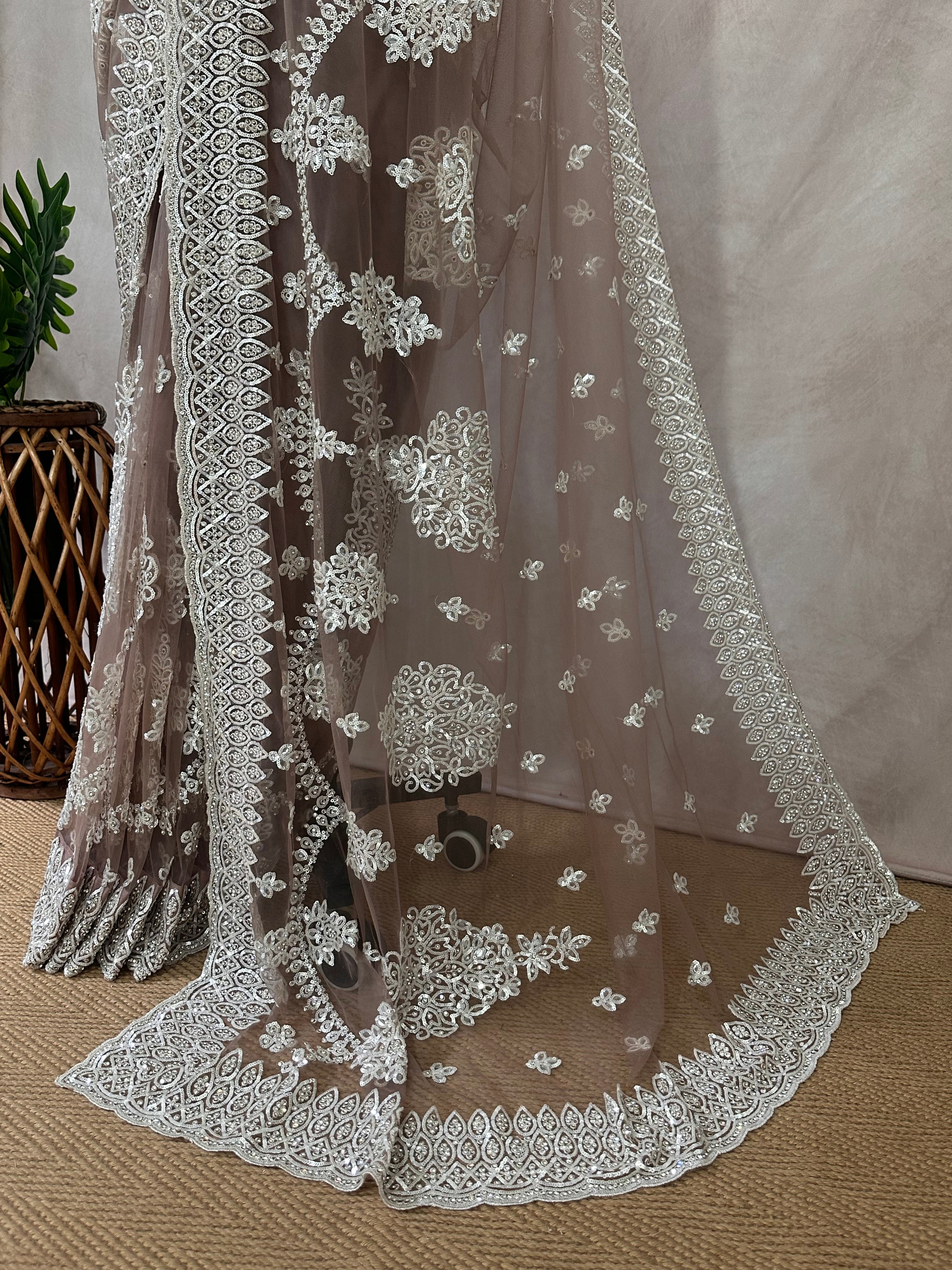 Heavy Embroidered Net Saree with stitched blouse and under skirt