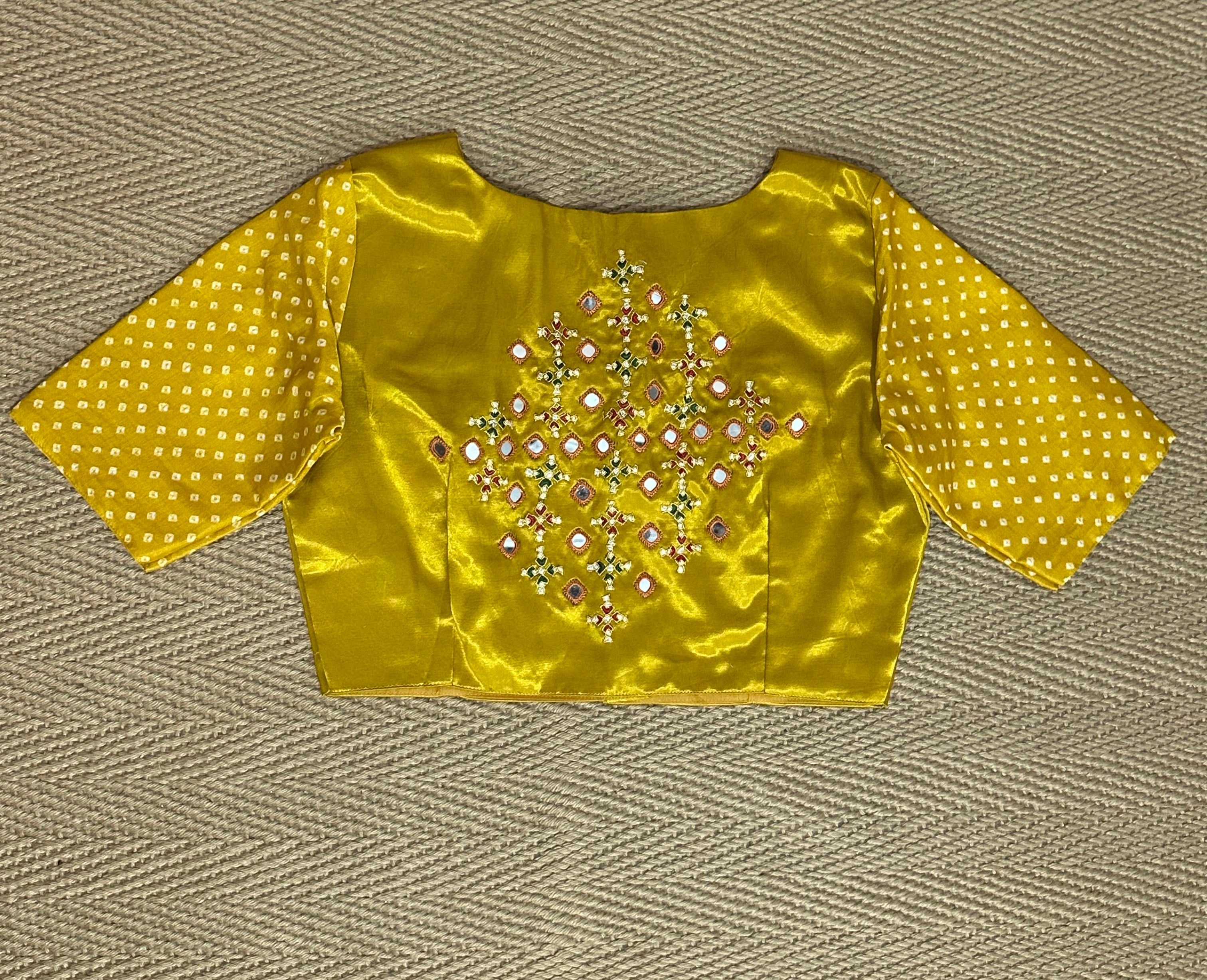 Mustard yellow modal silk blouse with mirror work and KutchEmbroidery