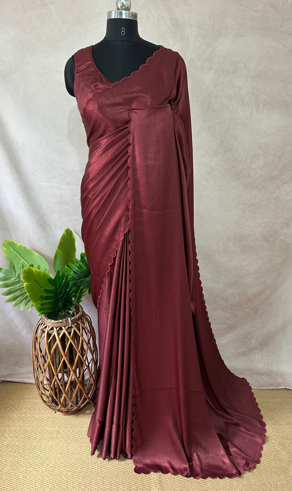 Shimmer crepe saree with scallop border, with stitched blouse