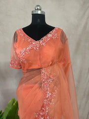 Soft Organza peach color saree with sequins work and stitched blouse