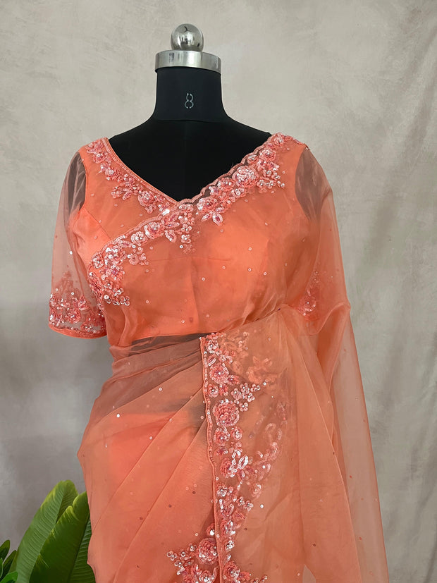 Soft Organza peach color saree with sequins work and stitched blouse