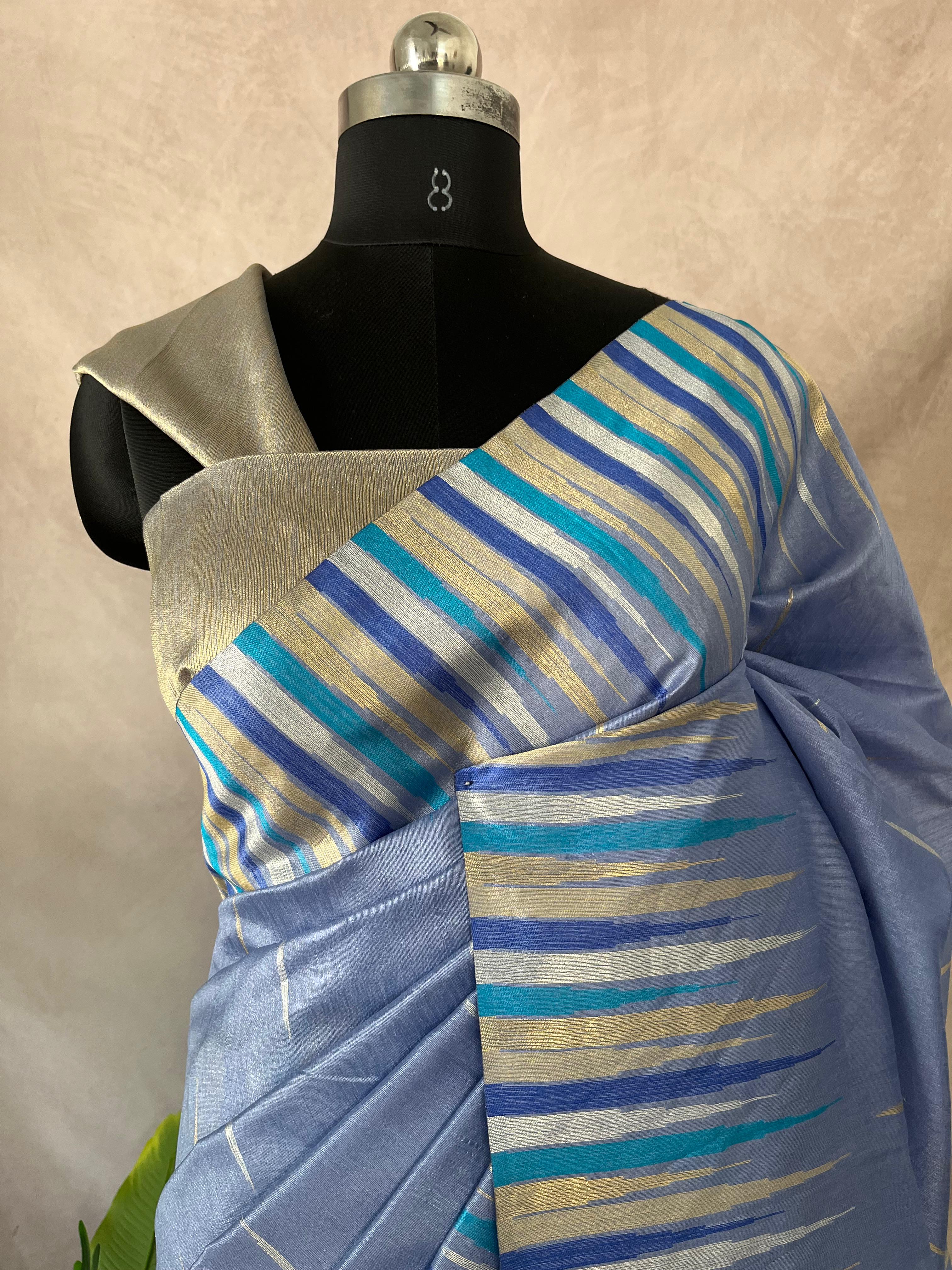 Pastel blue semi tussar silk saree with temple border, with BP