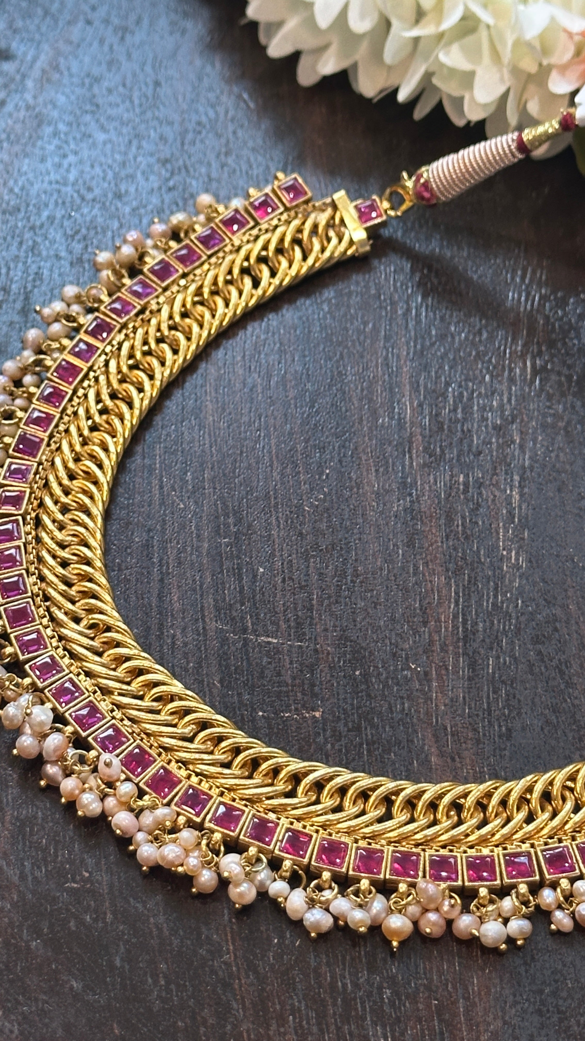 Designer inspired necklace with ruby red kemp stones