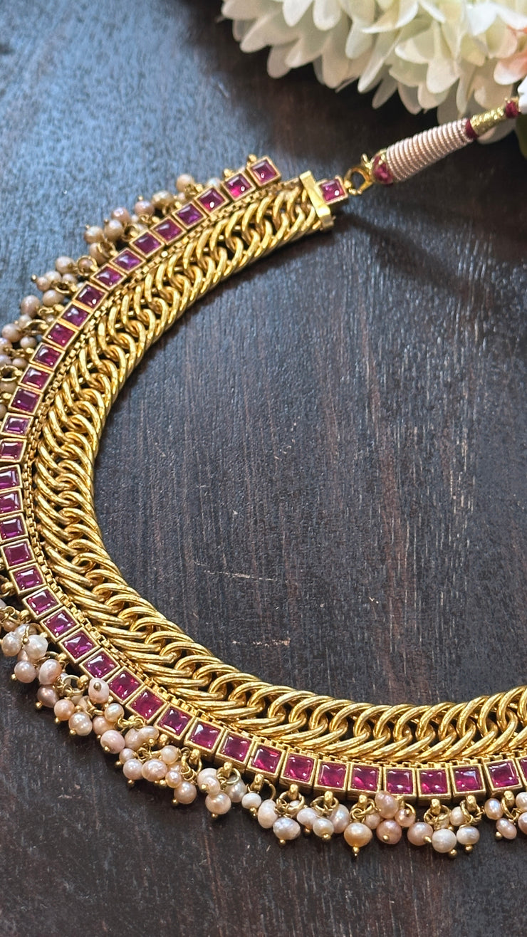 Designer inspired necklace with ruby red kemp stones