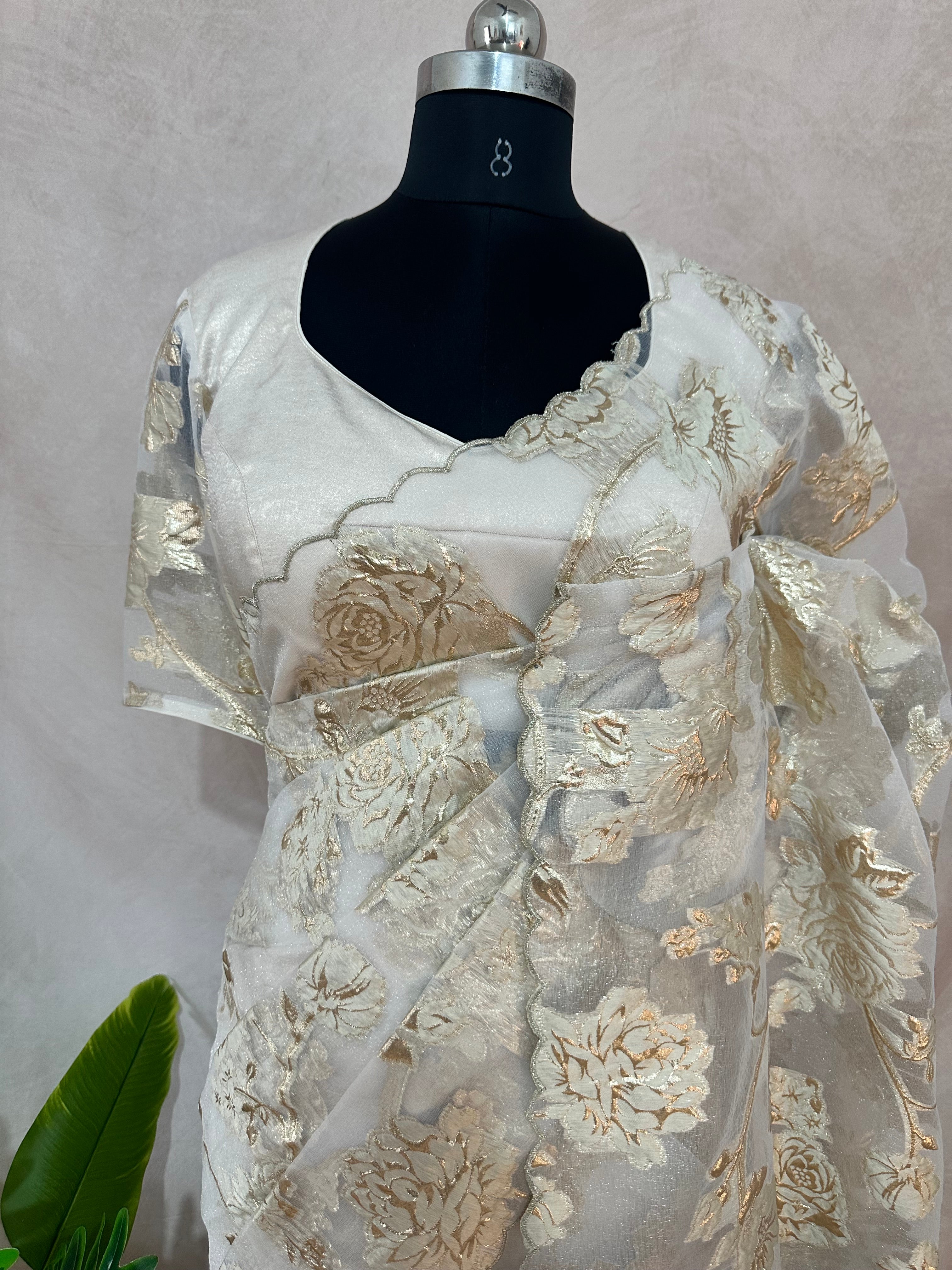 Off white turkkish organza saree with stitched blouse
