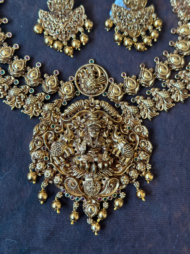 Antique finish lakshmi necklace with earring