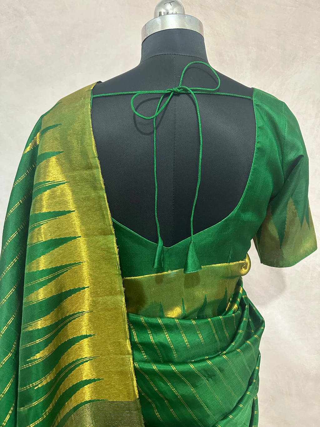 Handloom pure silk green gadwal silk saree with stitched blouse
