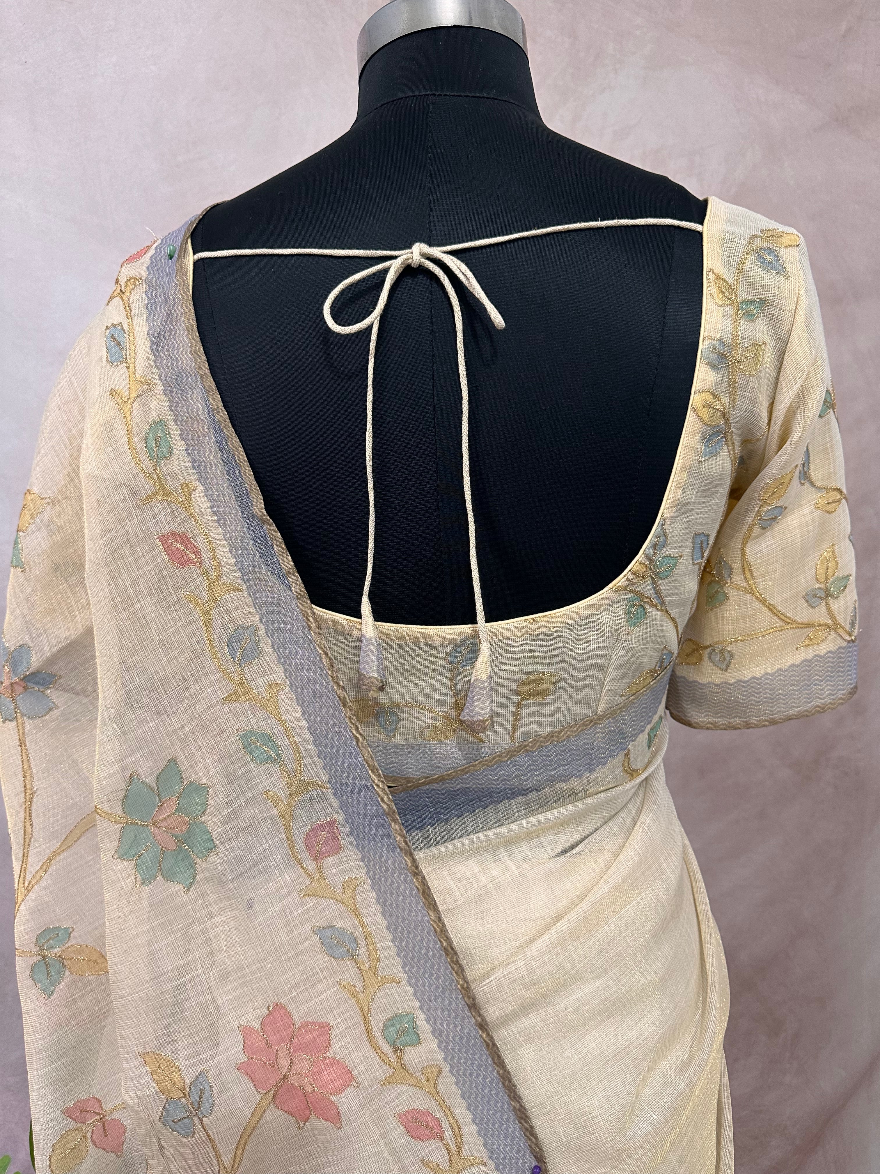 Printed Tissue linen saree with thread work, and stitched blouse