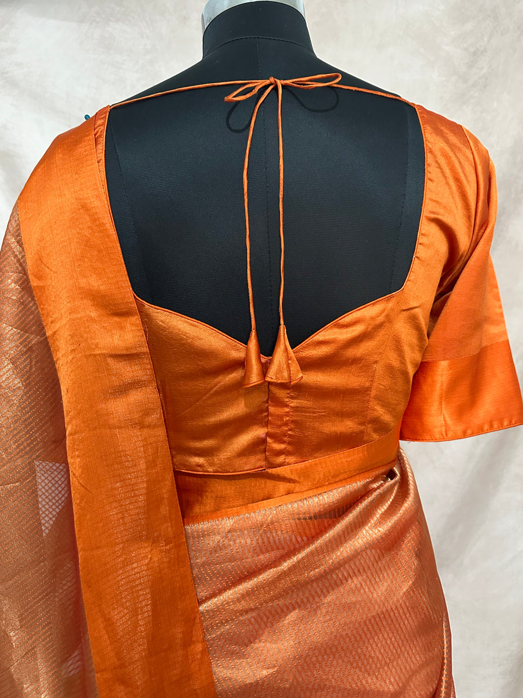 Orange stripe tissue silk saree with stitched blouse