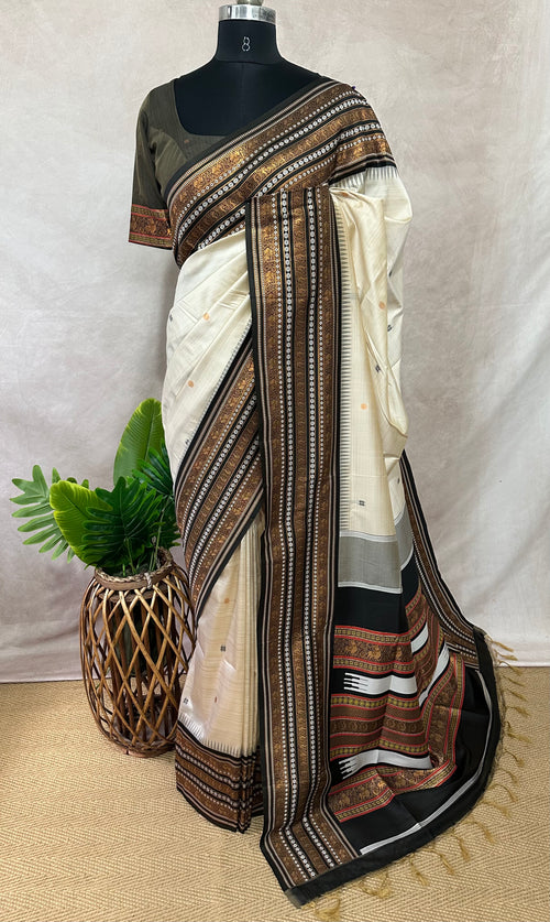 Asam silk saree with brown broder and stitched blouse