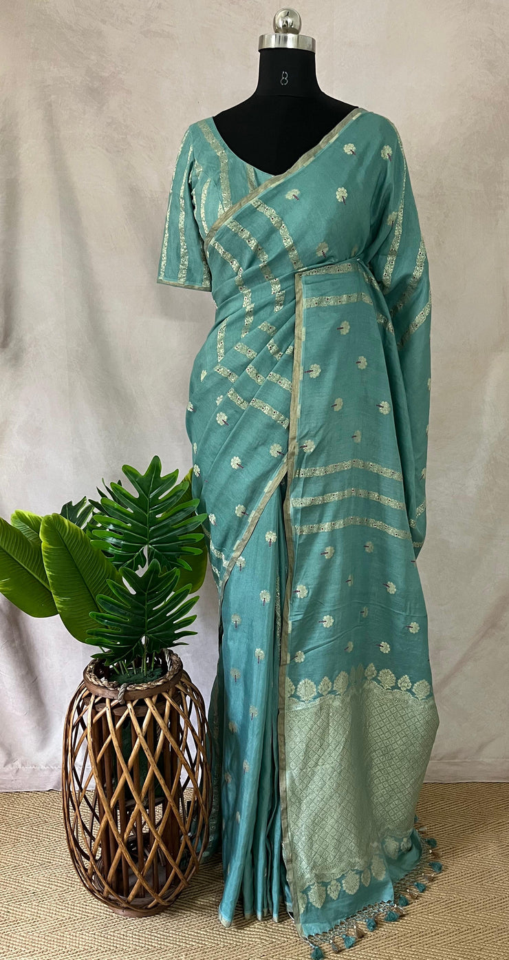 Pastel blue designer tussar georgette saree with meenakari weave , stitched blouse