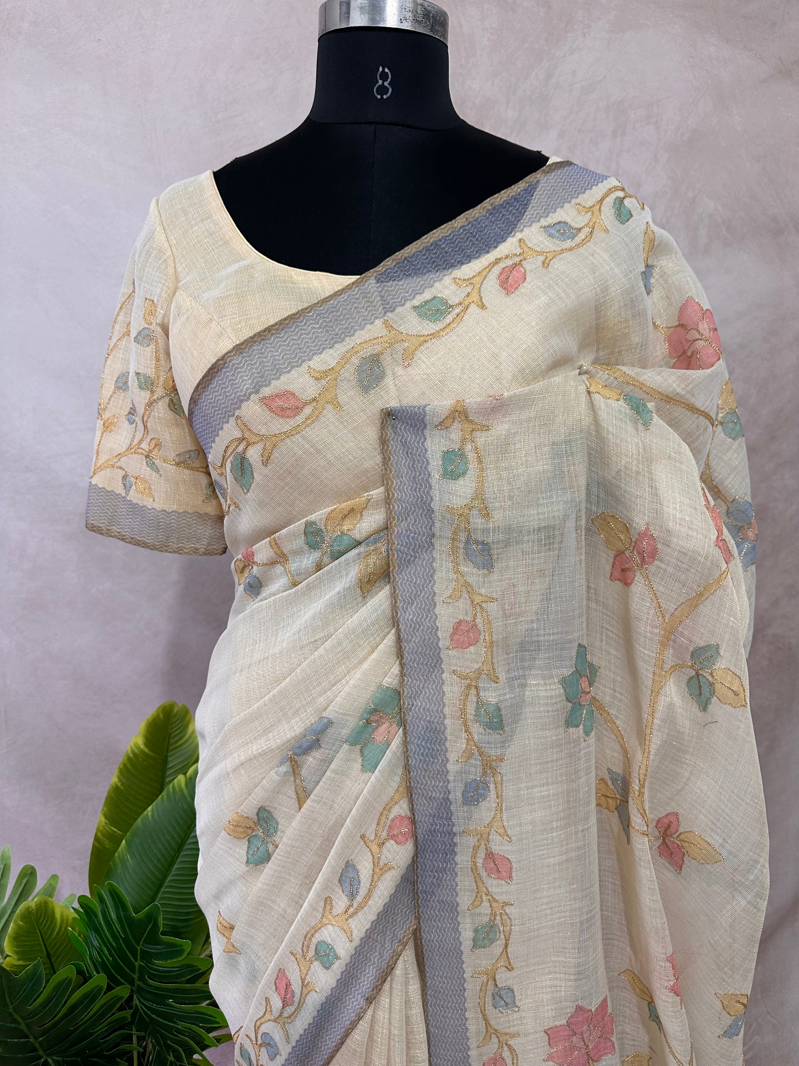 Printed Tissue linen saree with thread work, and stitched blouse