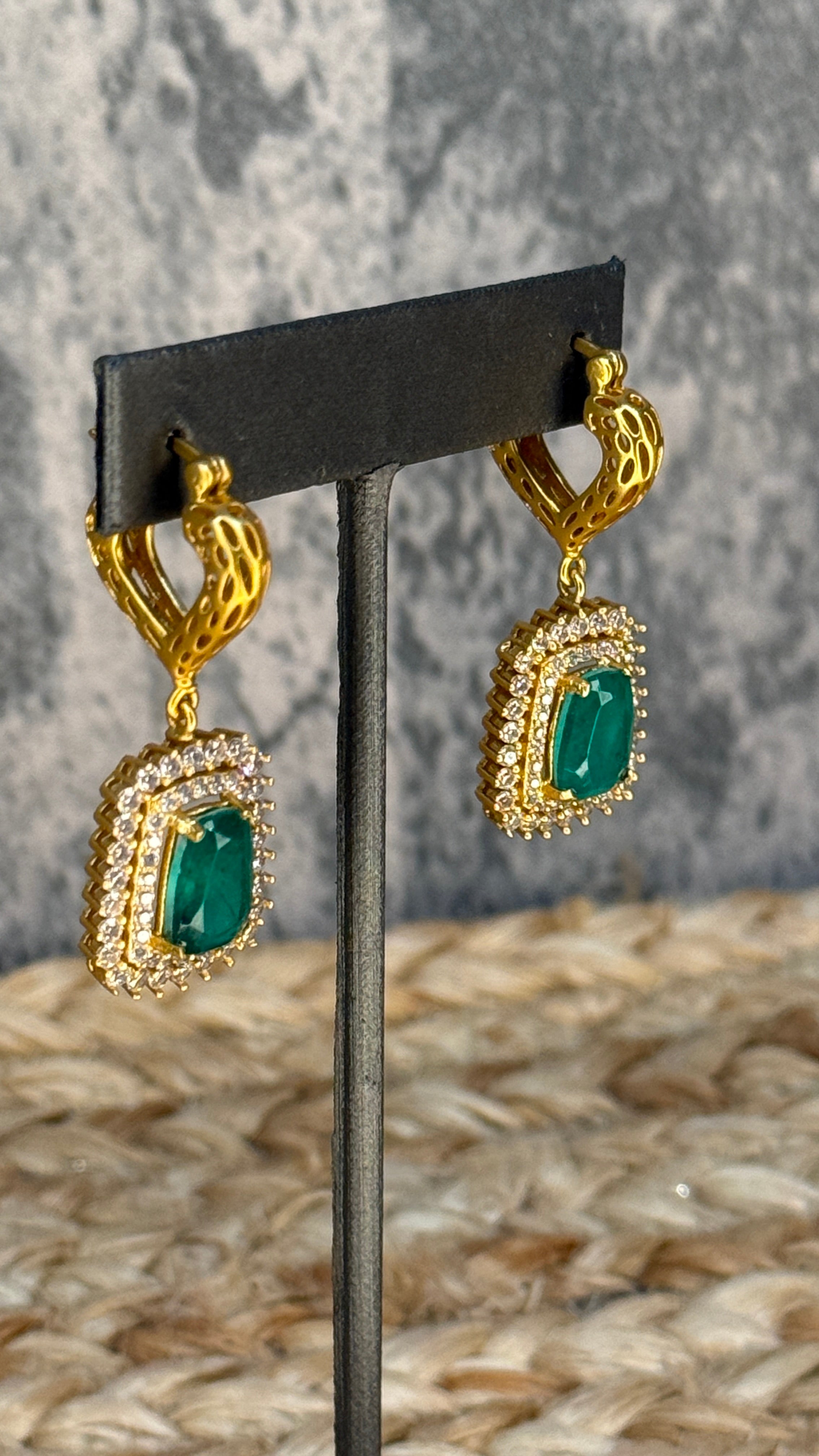 Earring with green stone