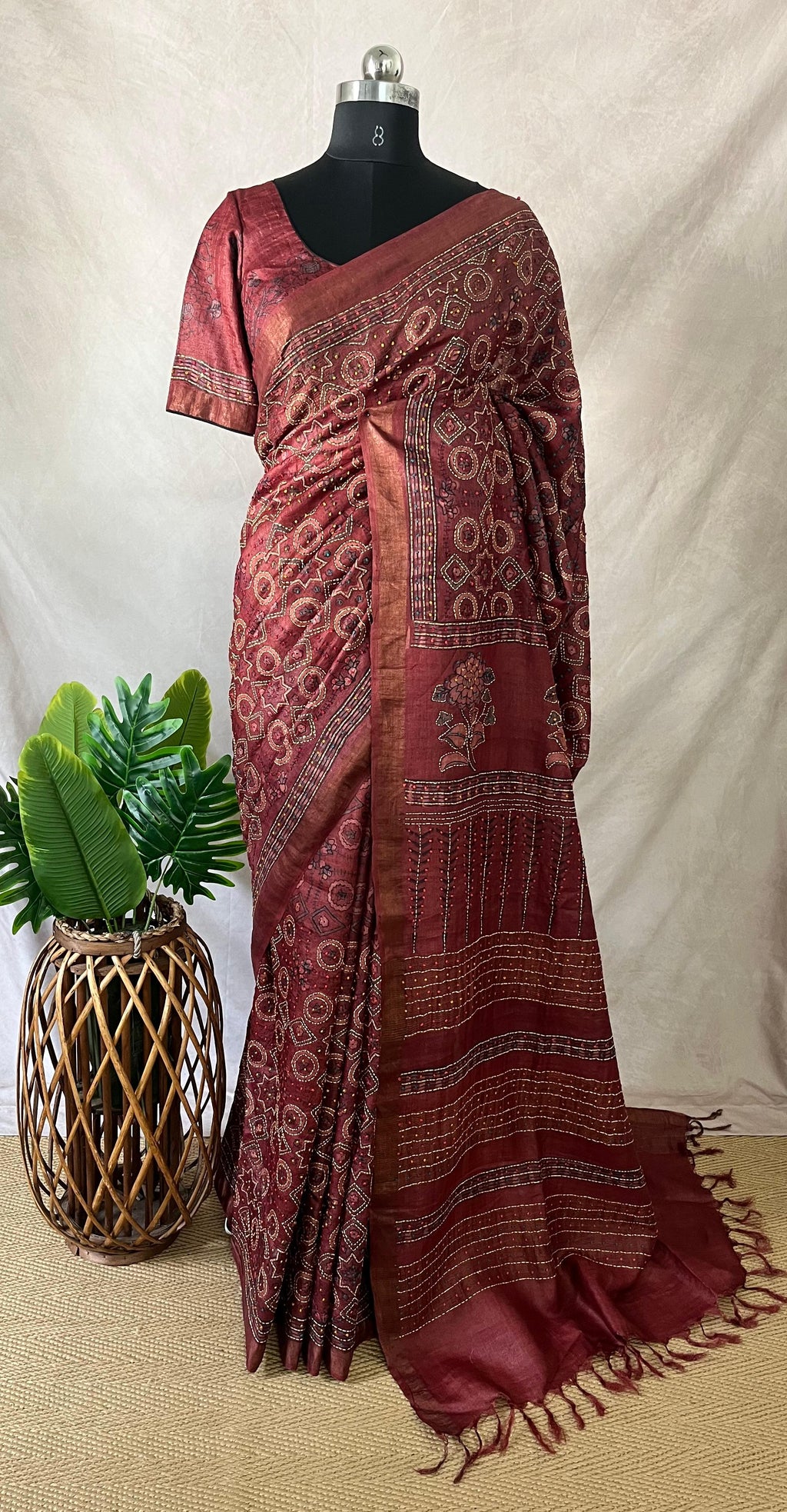 Pure tussar silk saree with Ajrakh hand block printed and high lighted with kanta work and stitched blouse