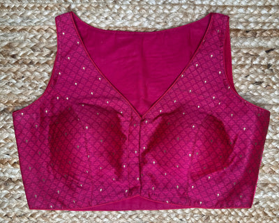 Pink silk sleeveless blouse