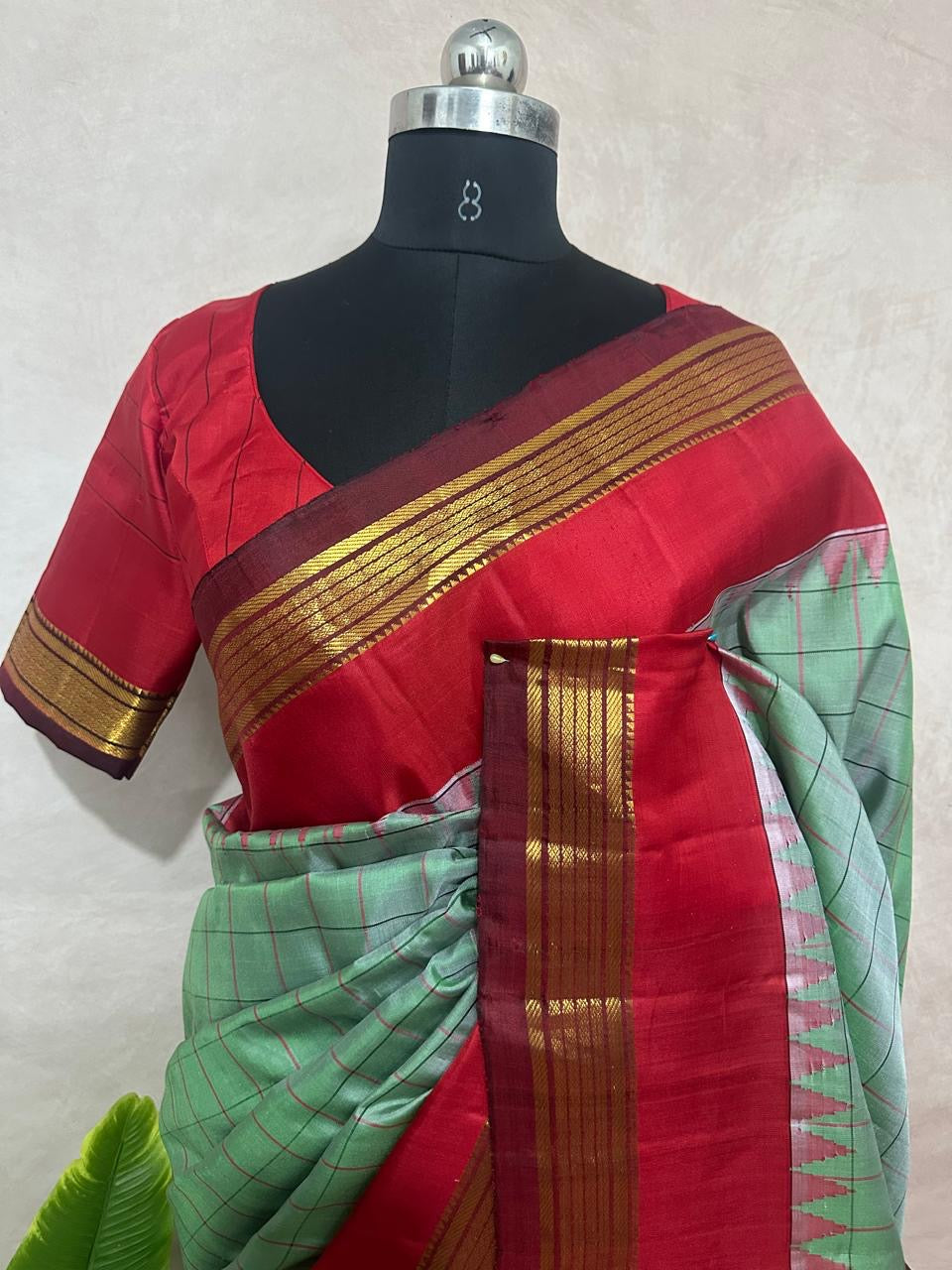 Handloom pure silk cotton green gadwal silk saree with stitched blouse