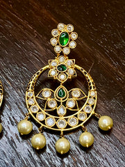 Earring with green stones