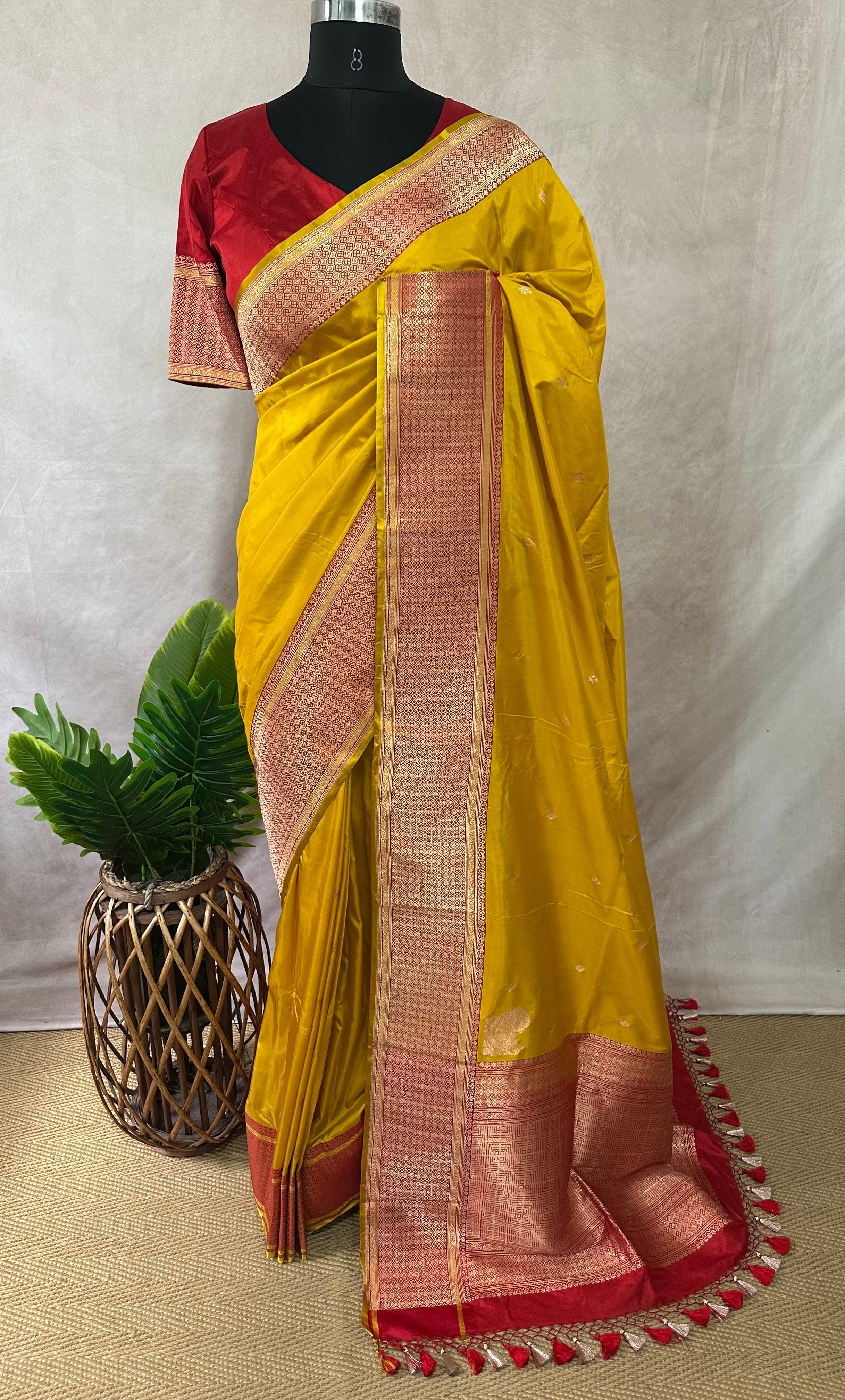 Yellow and red pure katan silk saree with stitched blouse